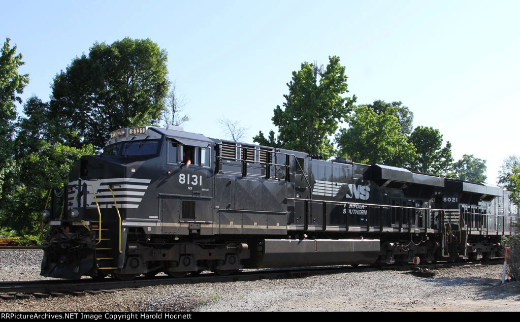 NS 8131 leads train 218 down the yard lead